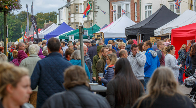 Crowds of people enjoying outstanding local food and drink at Honiton's Gate to Plate event