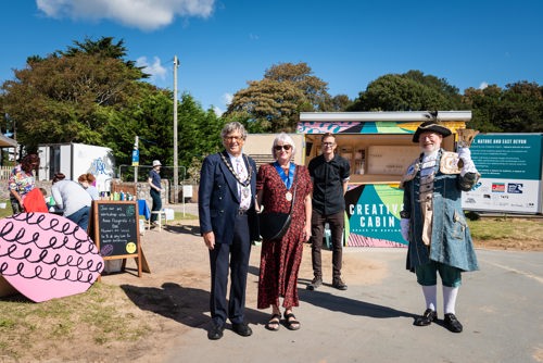 Councillors and guests welcome the Creative Cabin