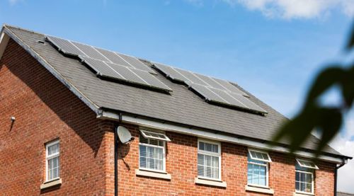 House with solar panels - Photo by In-Press Photography