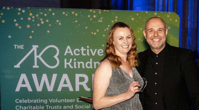 Lottie Edwards, Engagement Manager at LED Community Leisure with her Above & Beyond Award  