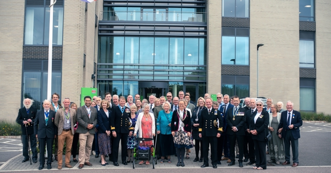 EDDC officers, current and former councillors, and members of the armed forces outside Blackdown House