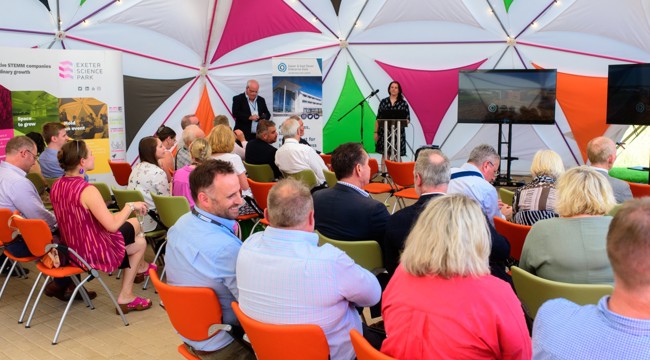 Business leaders listen carefully to speakers including Cllr Paul Arnott