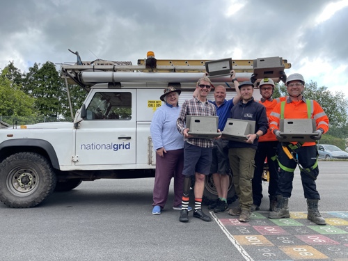 Partners at installation of Swift Boxes