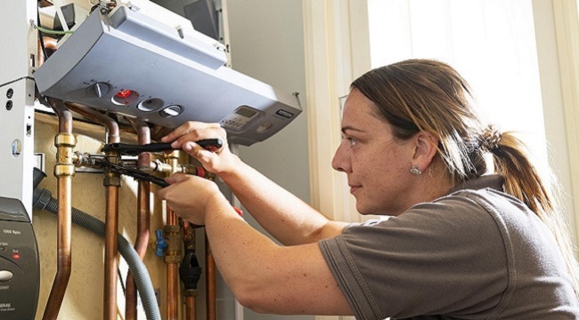 Liberty engineer attending to a boiler