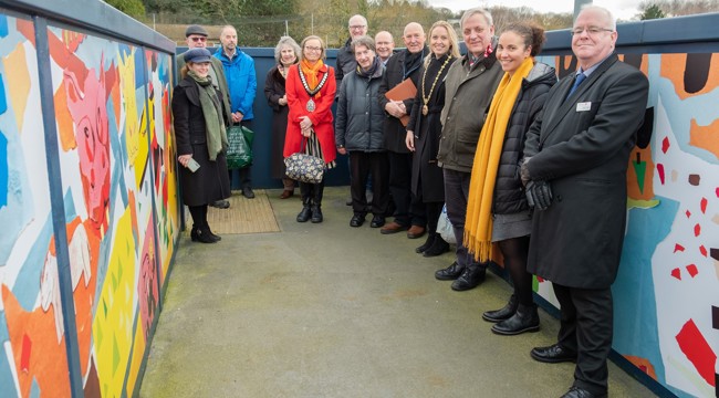 Fiona Page-Turner (Thelma Hulbert Gallery), Tony McCollum (Deputy Mayor, Honiton Town Council), Stephen Hill (Town Clerk, HTC), Councillor Jenny Brown (EDDC and HTC), Councillor Eleanor Rylance (Chair, East Devon District Council), Martin Pearce (Department for Transport), Martin Long (Chairman, The Friends of Honiton Station), Andrew Ardley (Regional Development Manager, South Western Railway), Councillor Steve Craddock (Honiton Town Council), Councillor Helen Hurford (Mayor, Honiton Town Council), Richard Burningham (Manager, Devon and Cornwall Rail Partnership), Gemma Girvan (Curator, Thelma Hulbert Gallery), Richard Gibson (Stakeholder Manager West & Wales, CrossCountry Trains).